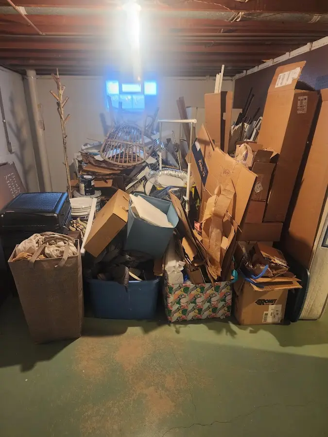 Roll-off dumpster container at job site for 6 Yard Dumpster Rental in Windsor Heights